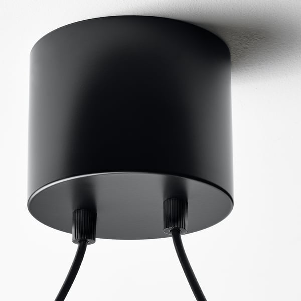Black cylindrical ceiling lamp; stylish, modern design. Adjustable height, three attached wires.
