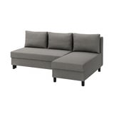 Modern grey l-shaped sofa, cozy & convertible, with storage & dark legs.