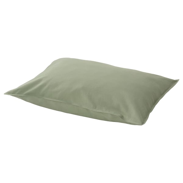 A green, rectangular, smooth fabric pillowcase made from 100% pre-washed cotton.