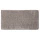 A plush ALMTJÄRN bath mat in beige. Its rectangular, soft, and made from recycled polyester, offering warmth and absorbency.
