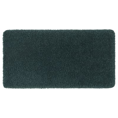 A rectangular green-gray ALMTJÄRN bath mat made of recycled polyester, featuring a soft pile and non-slip latex backing.