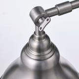 Stainless steel lamp with adjustable joint. High-quality, sleek design.