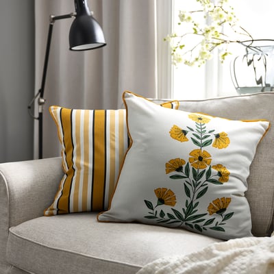 AROMATISK pillow with striped & floral designs, 18x18, enhancing sofa decor.