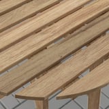Wooden outdoor table with slatted design. Quality acacia wood, smooth finish, evenly spaced slats.