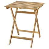 A brown wooden folding garden table named ASKHOLMEN, made from durable acacia with a natural finish, featuring a square top and x-shaped legs.