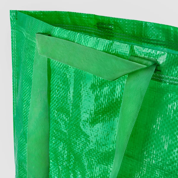 Green reusable shopping bag with sturdy handles and reinforced seams, designed for durability and easy cleaning.