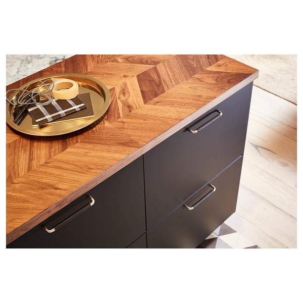 A wooden kitchen countertop named BARKABODA, featuring a dark brown, chevron-patterned walnut veneer.