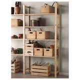 Shelf with woven baskets and crates in off-white, wood and rattan, holding gardening supplies.