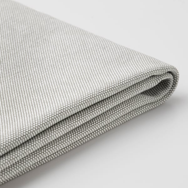 Close-up of BERGMUND fabric, showing soft, durable texture. Light gray color, tightly woven for comfort and durability.