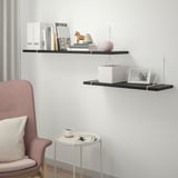 BERGSHULT shelves with decor. Armchair, cup, magazine.