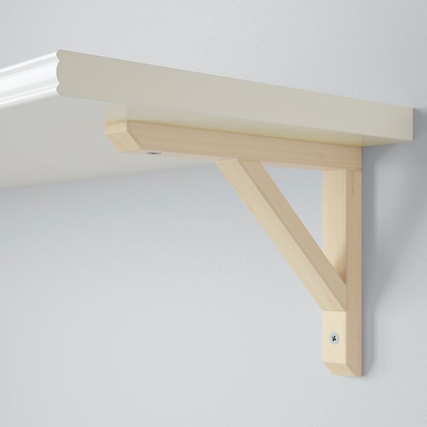 Wall-mounted light wood shelf with sturdy bracket, neatly fitted to white wall.