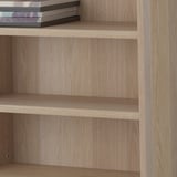Wooden shelves, adjustable, holding books. Part of BESTÅ storage system.