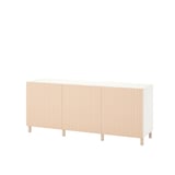 The BESTÅ sideboard in white with light-colored wood slats and solid wood legs, offering a minimalist design with adjustable shelves.