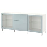 A white and light blue BESTÅ sideboard. It has a minimalist design with glass doors and steel legs.