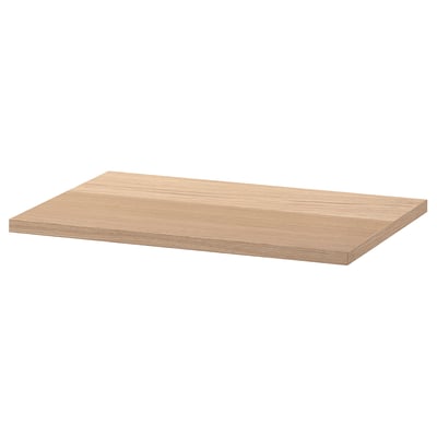 A BESTÅ top panel in oak effect. Flat, rectangular, fits furniture frames.