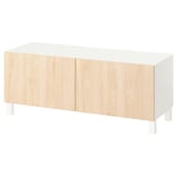 This image the ikea BESTÅ tv stand in white and light wood. It has a rectangular shape with two cabinets and minimalist design.