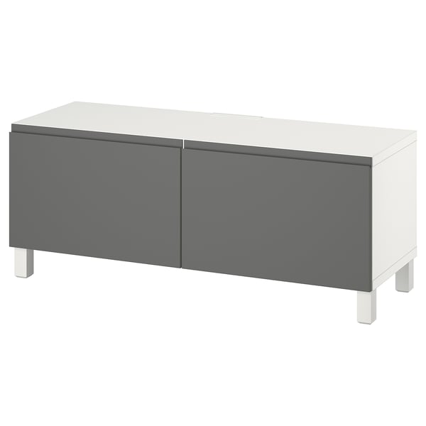 A white and gray BESTÅ tv bench with two doors and adjustable shelves, featuring a modern design and metal legs.
