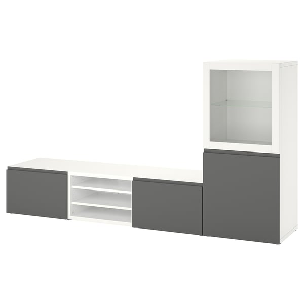 Modern white & gray BESTÅ storage unit. Three sections: tall cabinet, low drawers, open shelf. Minimalist design with adjustable shelves.