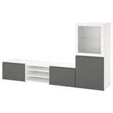 Modern white & gray BESTÅ storage unit. Three sections: tall cabinet, low drawers, open shelf. Minimalist design with adjustable shelves.