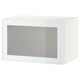 A white BESTÅ storage unit with a glass door on a white background.
