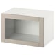 An ikea BESTÅ white storage unit with a single glass door. It has a rectangular shape and minimalist design.