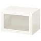 A white BESTÅ storage unit with a glass door on a white background.