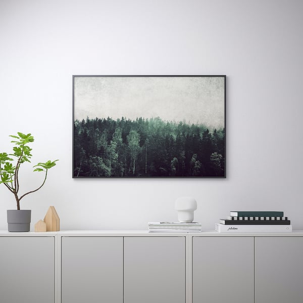 Misty trees wall art, plant, ornaments, lamp & books.