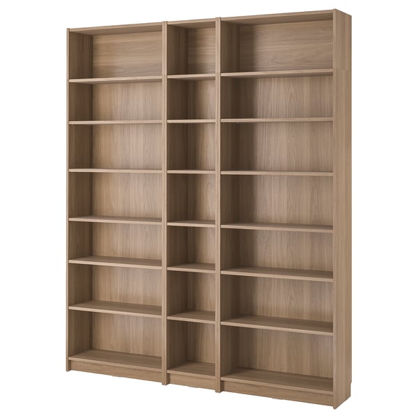 An empty BILLY bookcase. It is light brown, wooden, and rectangular with six open shelves. The design is simple and functional.