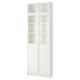 A tall, white BILLY bookcase with glass doors. It has multiple adjustable shelves for versatile storage.