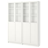 A white BILLY bookcase with glass doors. It adjustable shelves and a modern design for dust-free storage.