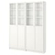 A white BILLY bookcase with glass doors. It adjustable shelves and a modern design for dust-free storage.