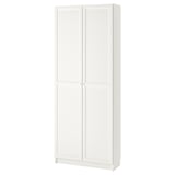 A white BILLY bookcase with doors. Its made of particleboard and has a simple, rectangular design with adjustable shelves.