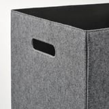 A sturdy gray fabric storage box with cut-out handles, designed for kallax shelving. Feels soft and high-quality, perfect for organizing items neatly.