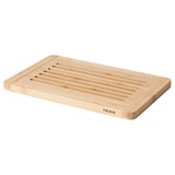 Ikea BLANDSALLAD bamboo cutting board, beige, rectangular with grooves for bread crumbs.