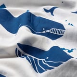 Two whale prints on white duvet, soft cotton, detailed blue shades.