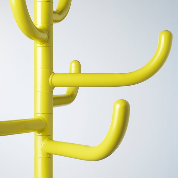 Bright yellow metal coat rack with multiple hooks, showcasing durable and vibrant finish.