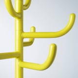 Bright yellow metal coat rack with multiple hooks, showcasing durable and vibrant finish.