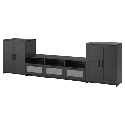 A black BRIMNES tv storage unit with doors and drawers. It a sleek, modern design with tempered glass drawers and adjustable shelves.