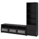 Black BRIMNES tv unit: wide console, 3 drawers, glass fronts; tall bookcase, 4 shelves for organized media storage.