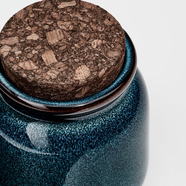 Close-up of BRUGDHAJ jar with cork lid, showcasing elegant glazed surface and natural cork texture.