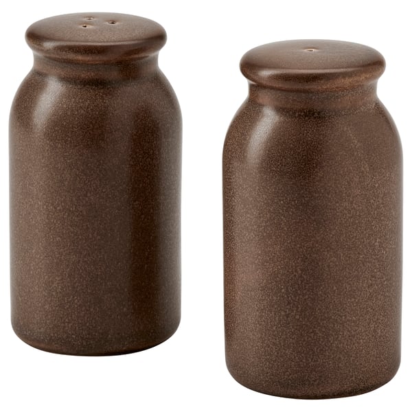 Two rustic brown ceramic salt and pepper shakers in stoneware with silicone rubber stoppers, displayed side by side.