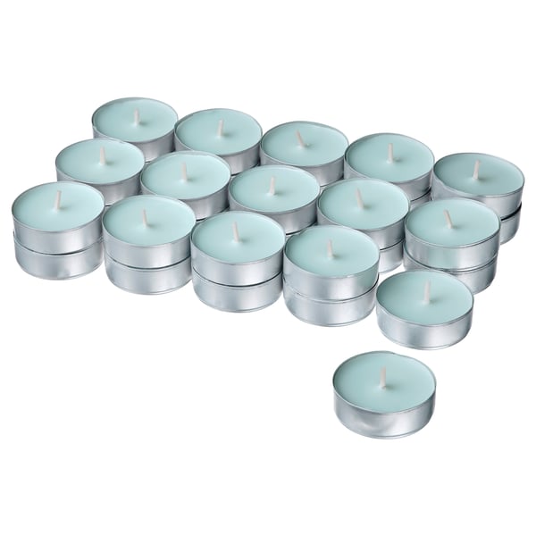 Multiple blue candles in metal holders arranged closely, rustic, modern decor item.