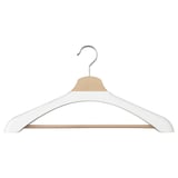 A white shoulder shaper for a hanger, designed to preserve sweater and blouse shapes.
