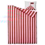 Circus-themed bedding set with red and white striped design, featuring a tent and flag pillowcase. Made from cotton and lyocell for comfort.