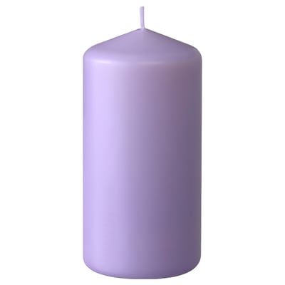 Single lavender-colored pillar candle with cylindrical shape and smooth finish, made of paraffin and plant-based wax.