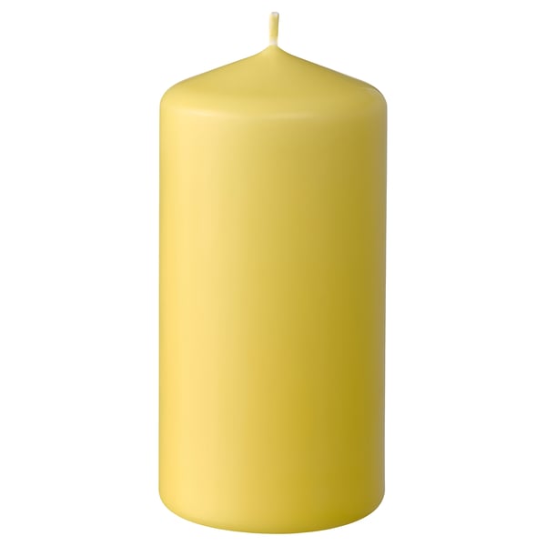 DAGLIGEN: yellow pillar candle with smooth, rounded top. Solid, unscented, made of paraffin and plant wax.