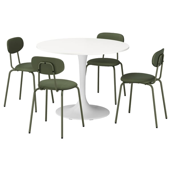 A DOCKSTA dining set with a white round table and four green chairs. The chairs have a metal frame and a curved backrest for comfort.