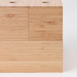 Wooden storage boxes made of polished bamboo, featuring multiple compartments for organizing items.