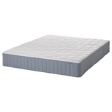 An IKEA DUNVIK blue foam mattress. The design includes an upholstered cover with a diamond pattern, and it a rectangular shape.