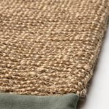 Natural jute body scrub with textured surface and firm edge, designed for effective exfoliation.